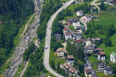 High angle view of road amidst buildings in town