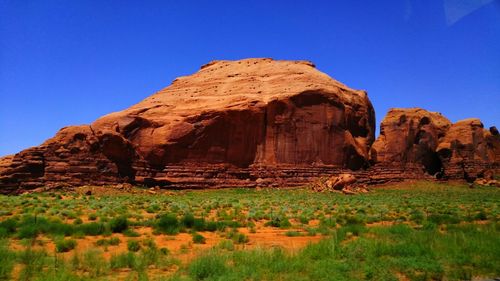 Scenic view of rocky mountains against clear sky