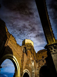 Low angle view of historic building against sky