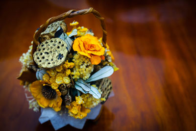 Close-up of wilted flower on table