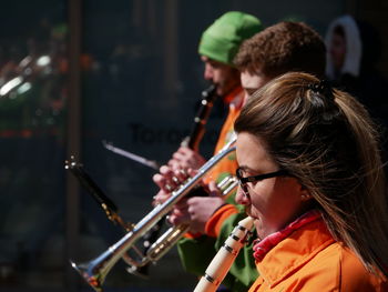 Portrait of people playing music concert