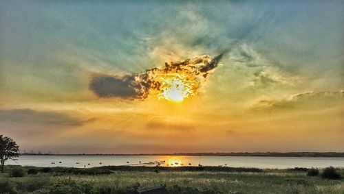 Scenic view of sea at sunset