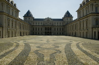 Facade of historic building against sky