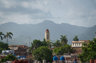 Buildings in city against sky