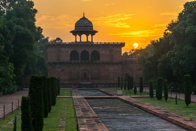 Building against sky during sunset