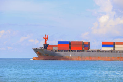 View of ship in sea against sky