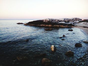 Scenic view of sea against clear sky