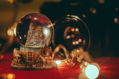 Close-up of illuminated christmas lights on table