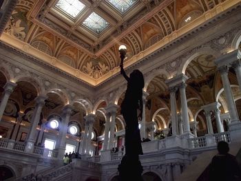 Low angle view of illuminated chandelier