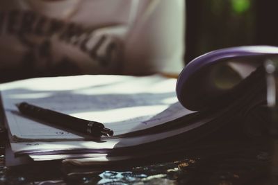 Close-up of cigarette on table