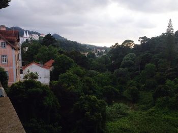 View of house against cloudy sky