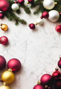 Directly above shot of christmas decorations on white background