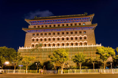 Low angle view of historical building at night