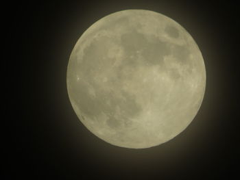 Low angle view of moon against sky at night