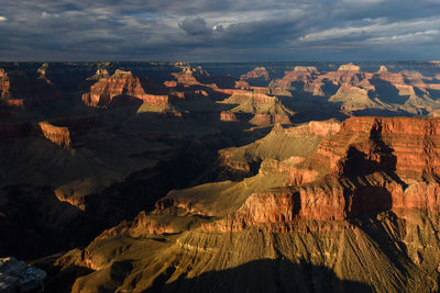 Scenic view of rock formations against sky