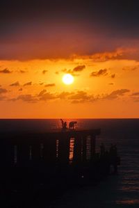 Scenic view of sea at sunset