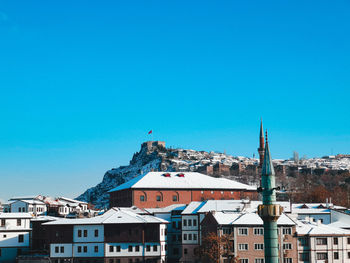 Townscape against blue sky