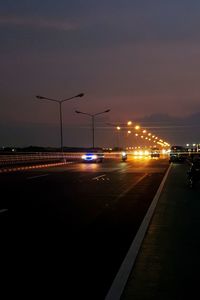Cars on road at night