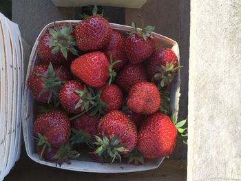 High angle view of strawberries on table