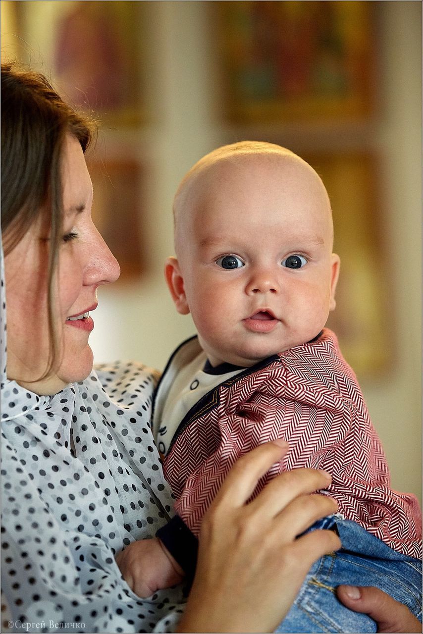 PORTRAIT OF A MOTHER AND BABY