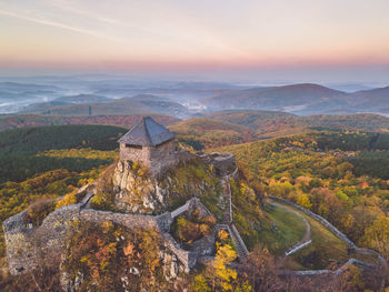 Scenic view of mountains against sky during sunset