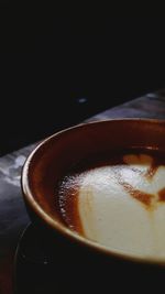 Close-up of coffee cup on table