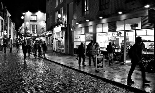 People walking on city street