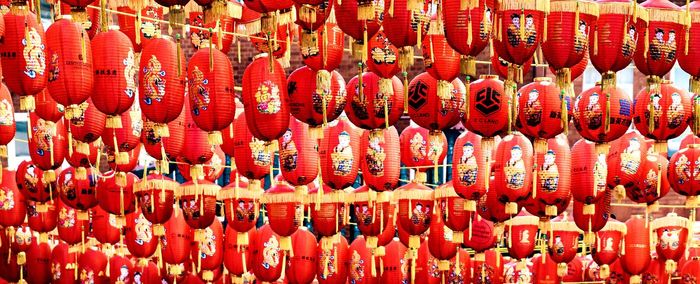 Full frame shot of red lanterns hanging in market