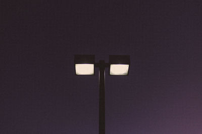 Low angle view of illuminated light