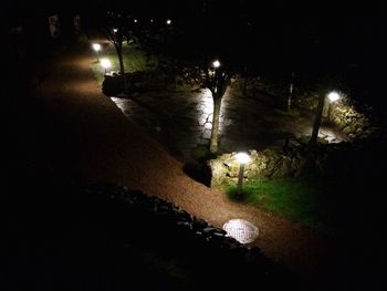 Illuminated street lights at night