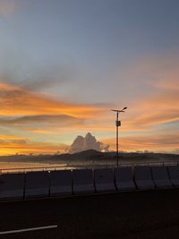 Sunset sky cloud lamp street outdoor evening peace object nature no people sea water good feeling