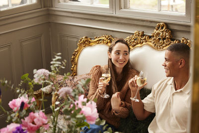 Couple celebrating in luxury house