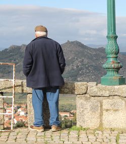 Woman standing on mountain