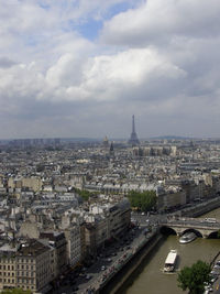 Distant view of eiffel tower amidst cityscape