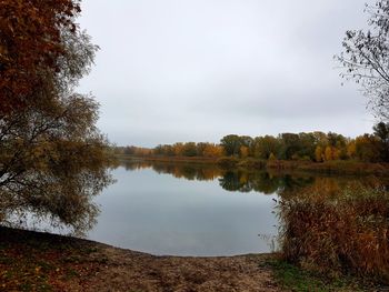 Scenic view of lake against sky during autumn