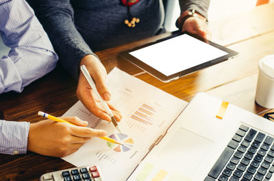 Business people working at desk in office