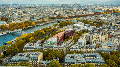 High angle view of buildings and trees in city