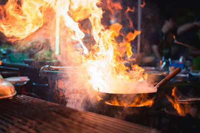 Close-up of bonfire on barbecue grill