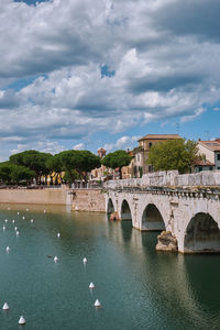 Bridge over river against sky