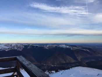 Scenic view of mountains against sky during winter