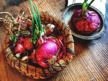 High angle view of vegetables in basket on table