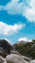 Low angle view of rocks against sky