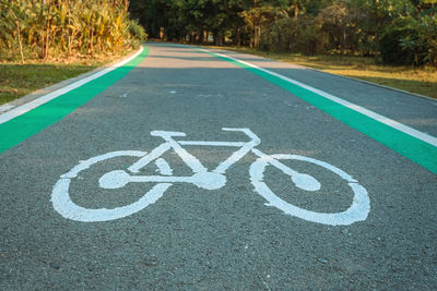 Arrow symbol on road in city