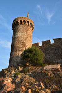 Low angle view of historic building against sky