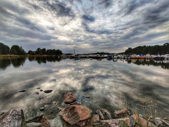 Scenic view of lake against sky during sunset