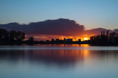 Silhouette of potsdam during sunset with the river havel