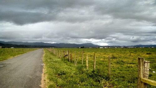 Country road leading towards mountains