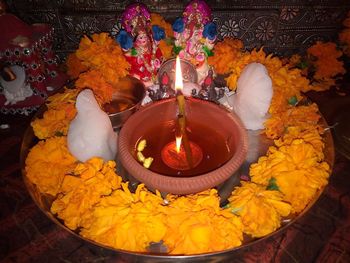 High angle view of illuminated flower in temple