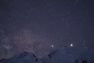 Low angle view of star field against sky at night