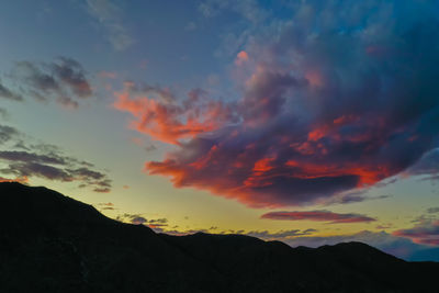 Low angle view of dramatic sky during sunset